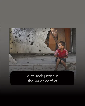 syrian boy seated in the street