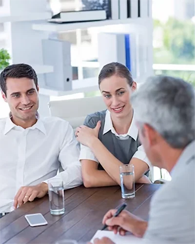 people talking in an office